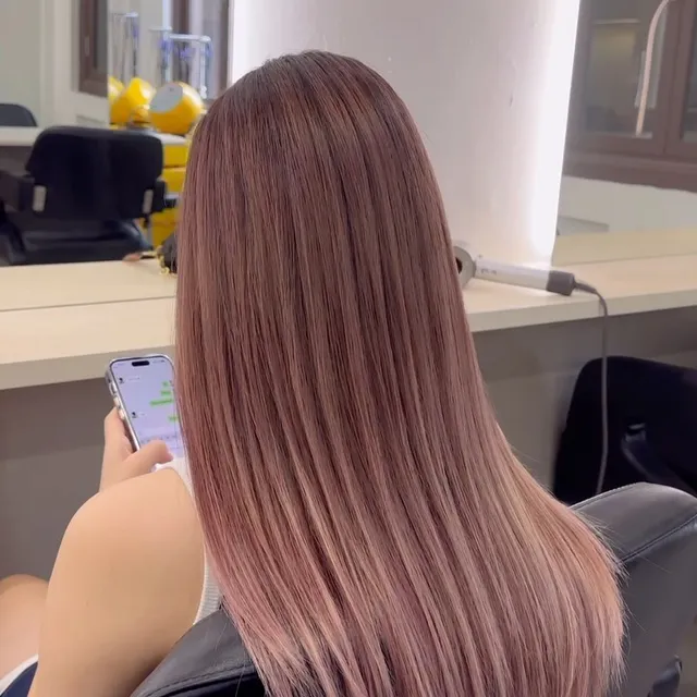 Rose-brown colour on sleek straight hair